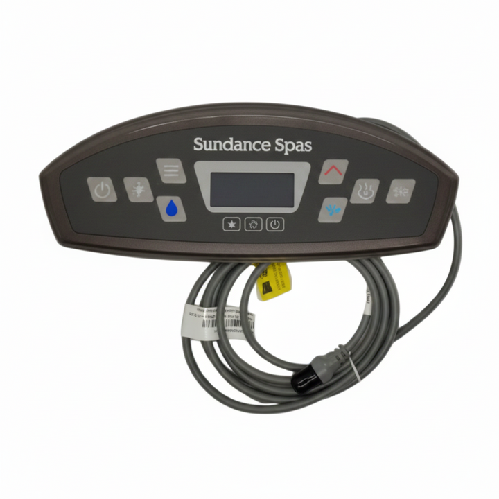 Sundance Spas digital control panel with attached gray cable, shown in its plastic shrink wrap on a light gray background.